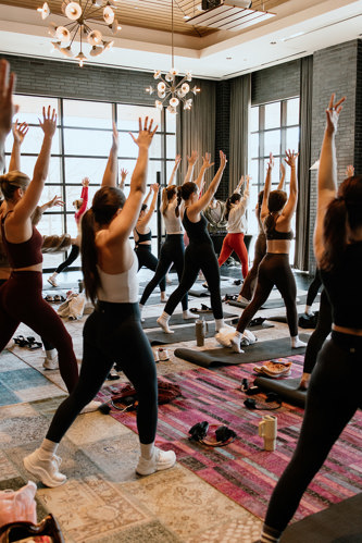 women stretching in a fitness class