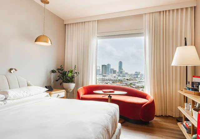 Stylish and cosy seating area with a vibrant and welcoming atmosphere.