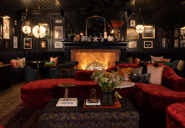  Intimate speakeasy bar with dim lighting, plush seating, and a nostalgic vibe, perfect for late-night cocktails.